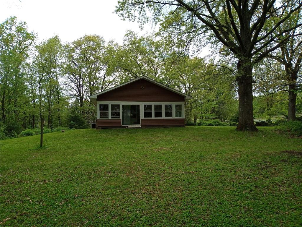 3292 Georgetown Road Polk, PA 16342 - Photo 5 of 24 a view of a house with a yard