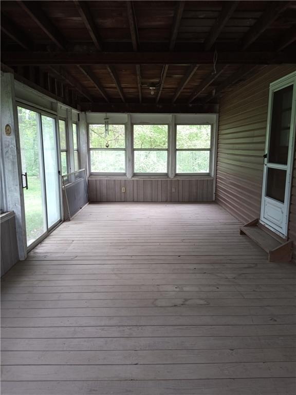 3292 Georgetown Road Polk, PA 16342 - Photo 7 of 24 a large bed sitting in a spacious bedroom next to a window