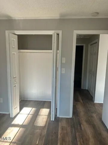 a view of gallery with wooden floor