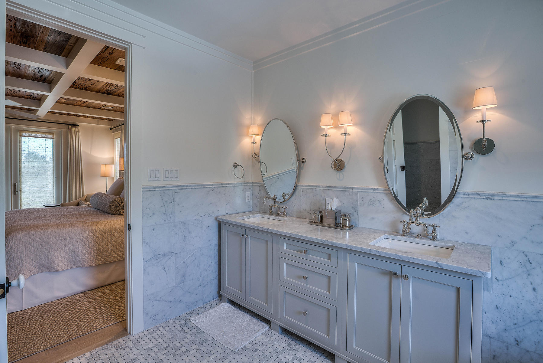 337 Blue Mountain Road Santa Rosa Beach, FL 32459 - Photo 11 of 31 a en suite bathroom with double vanity sinks and a mirror