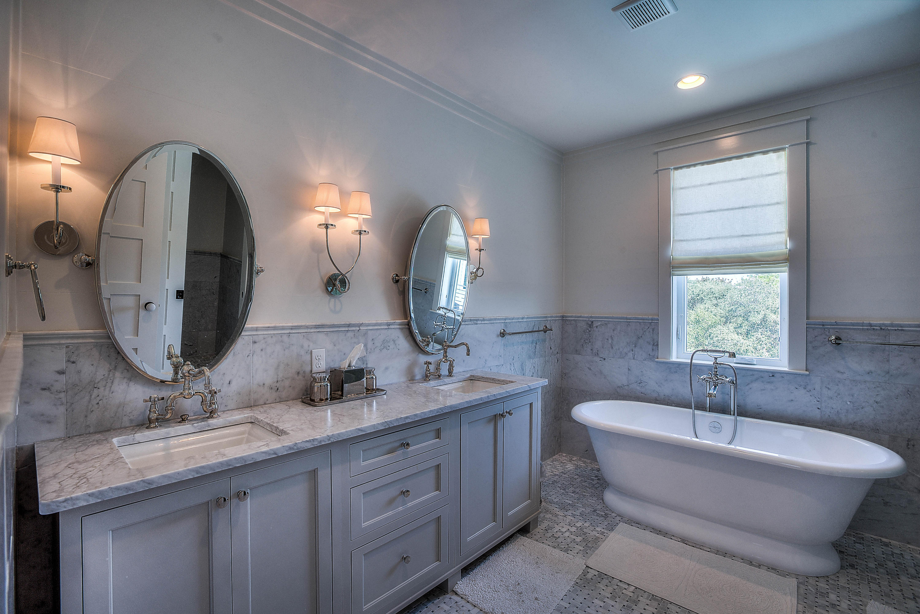 337 Blue Mountain Road Santa Rosa Beach, FL 32459 - Photo 12 of 31 a bathroom with a double vanity sink and a mirror
