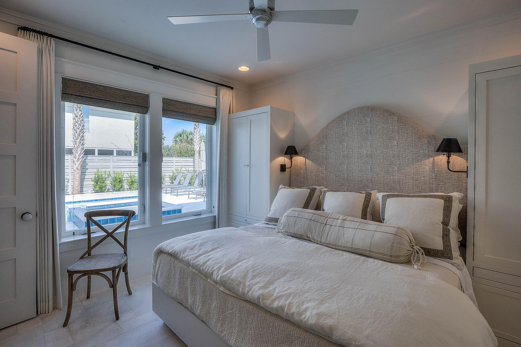 337 Blue Mountain Road Santa Rosa Beach, FL 32459 - Photo 20 of 31 a bed room with a bed and a chair