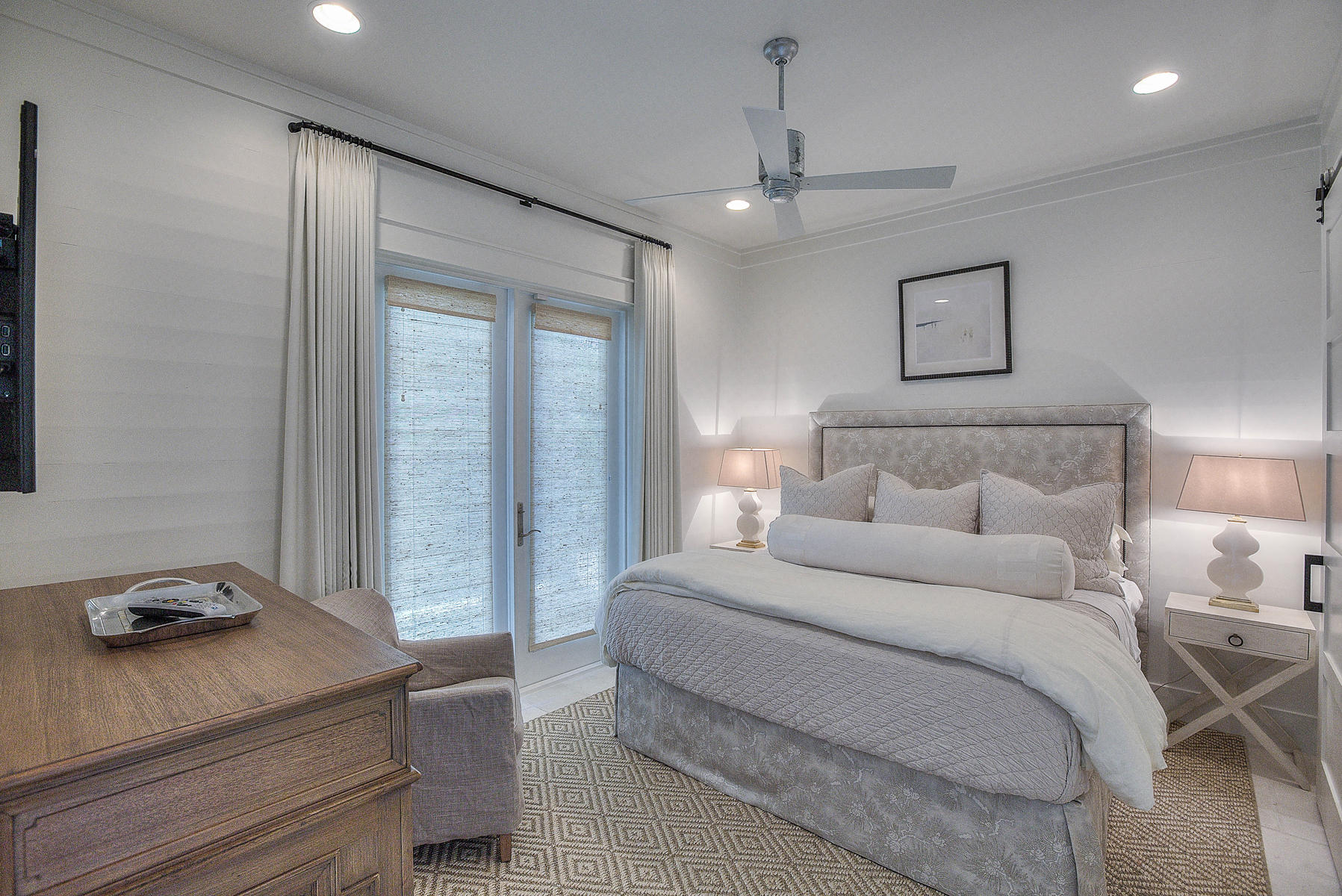 337 Blue Mountain Road Santa Rosa Beach, FL 32459 - Photo 23 of 31 a bedroom with a bed and a walk in closet