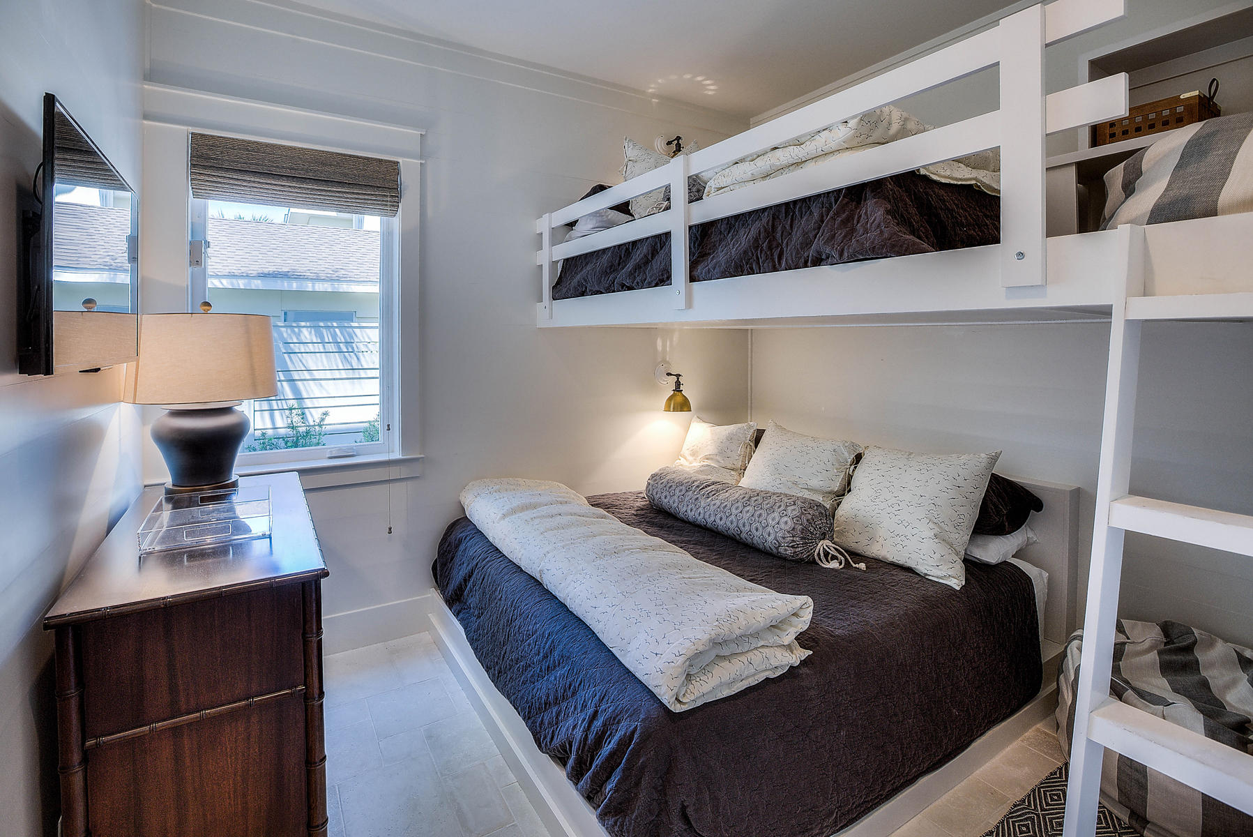 337 Blue Mountain Road Santa Rosa Beach, FL 32459 - Photo 24 of 31 a bedroom with a large bed and a window