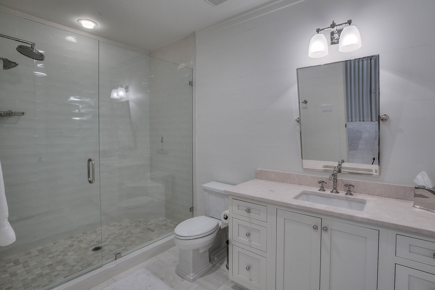 337 Blue Mountain Road Santa Rosa Beach, FL 32459 - Photo 25 of 31 a bathroom with a sink a toilet and shower