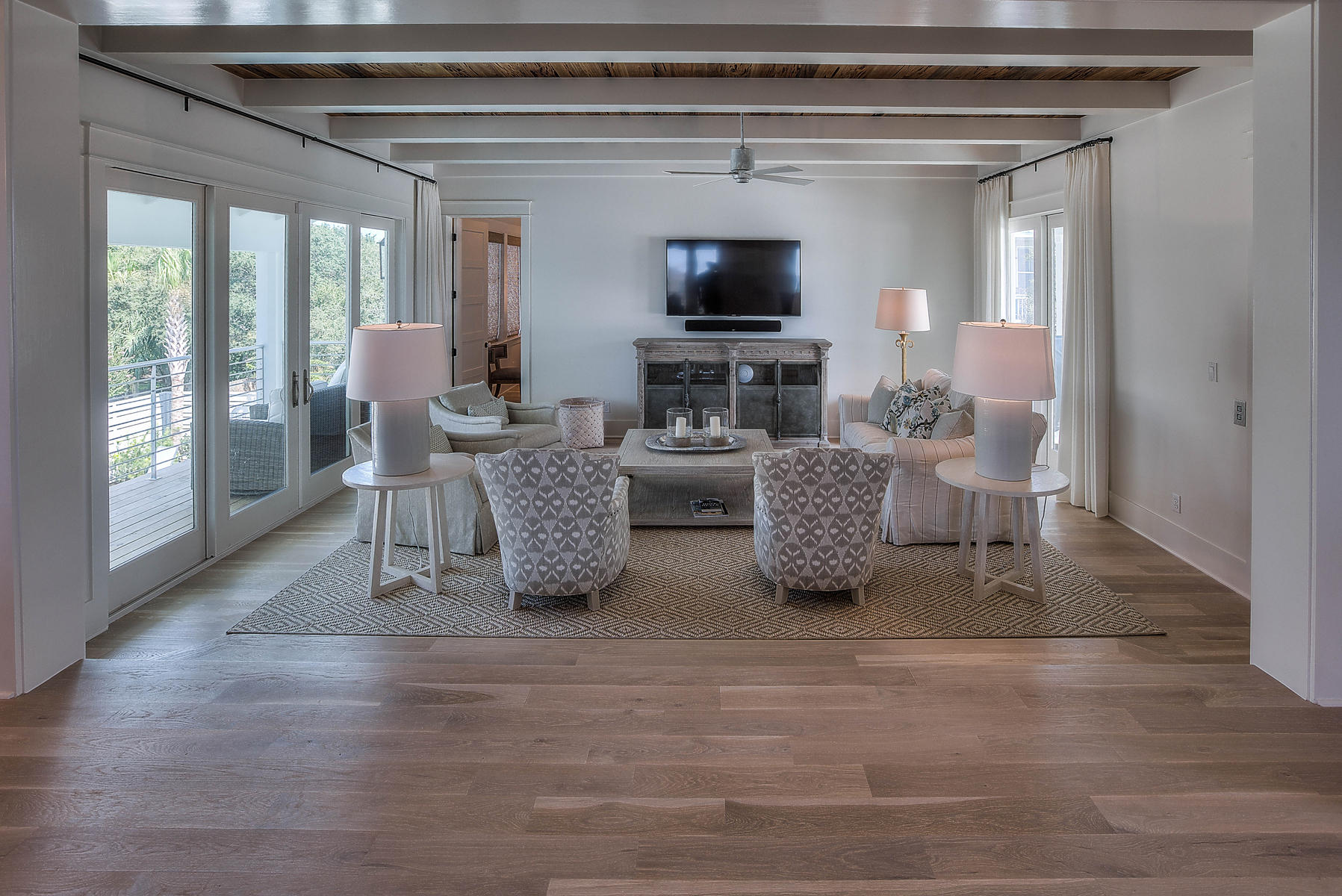 337 Blue Mountain Road Santa Rosa Beach, FL 32459 - Photo 6 of 31 a living room with furniture and a flat screen tv