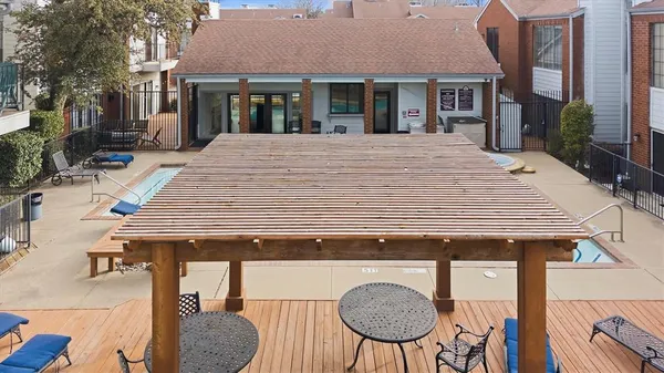 a view of a house with wooden floor and a seating space