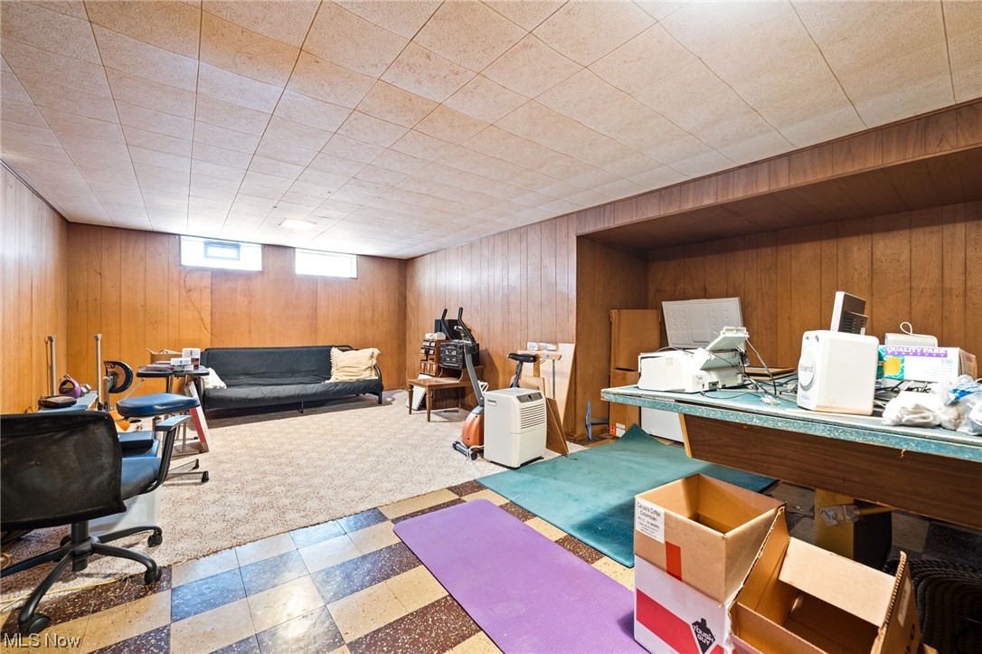5695 Cherokee Road Cleveland, OH 44124 - Photo 23 of 35 Basement with paneled nwood walls