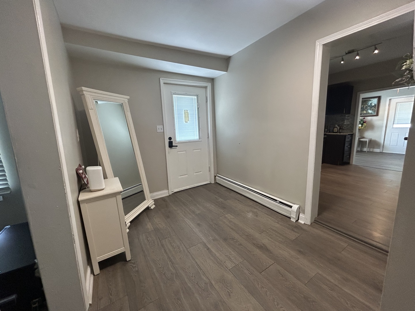 6232 Washington Street Chicago Ridge, IL 60415 - Photo 11 of 33 wooden floor in an empty room and a window