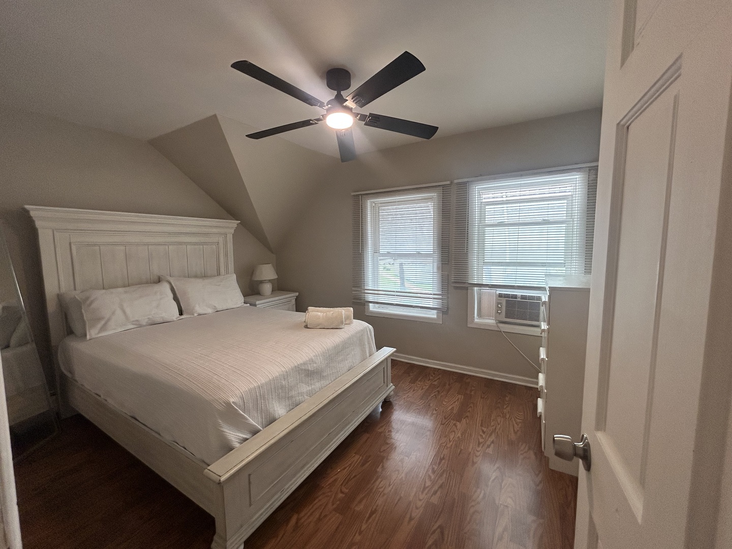 6232 Washington Street Chicago Ridge, IL 60415 - Photo 19 of 33 a bed sitting in a bedroom next to a window