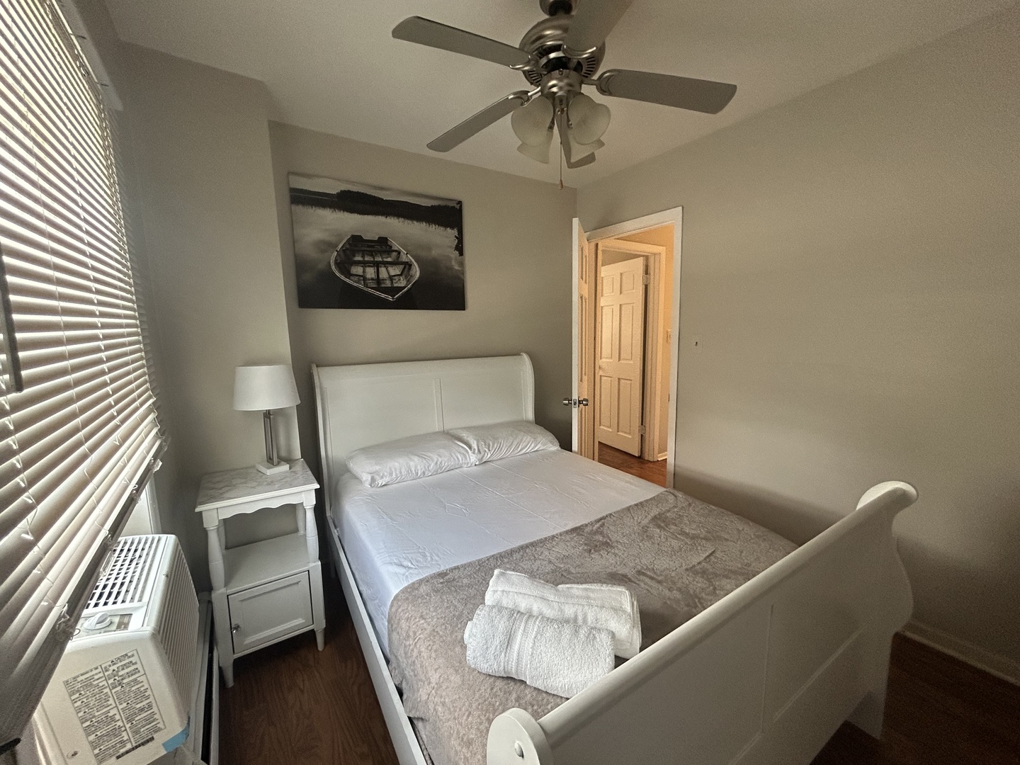 6232 Washington Street Chicago Ridge, IL 60415 - Photo 23 of 33 a bedroom with a bed and a chandelier