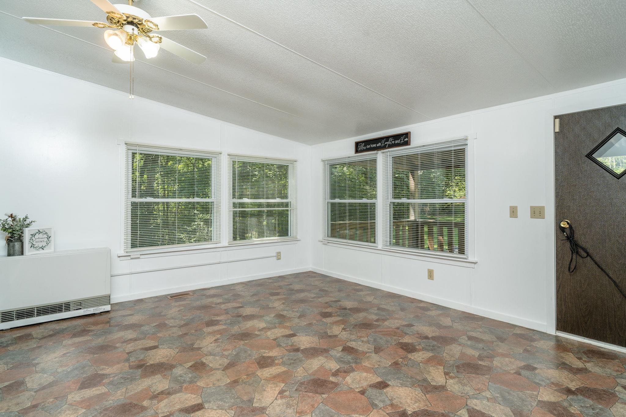 414 Bear Trap Farm Road Mount Solon, VA 22843 - Photo 2 of 40 a view of an empty room with a window
