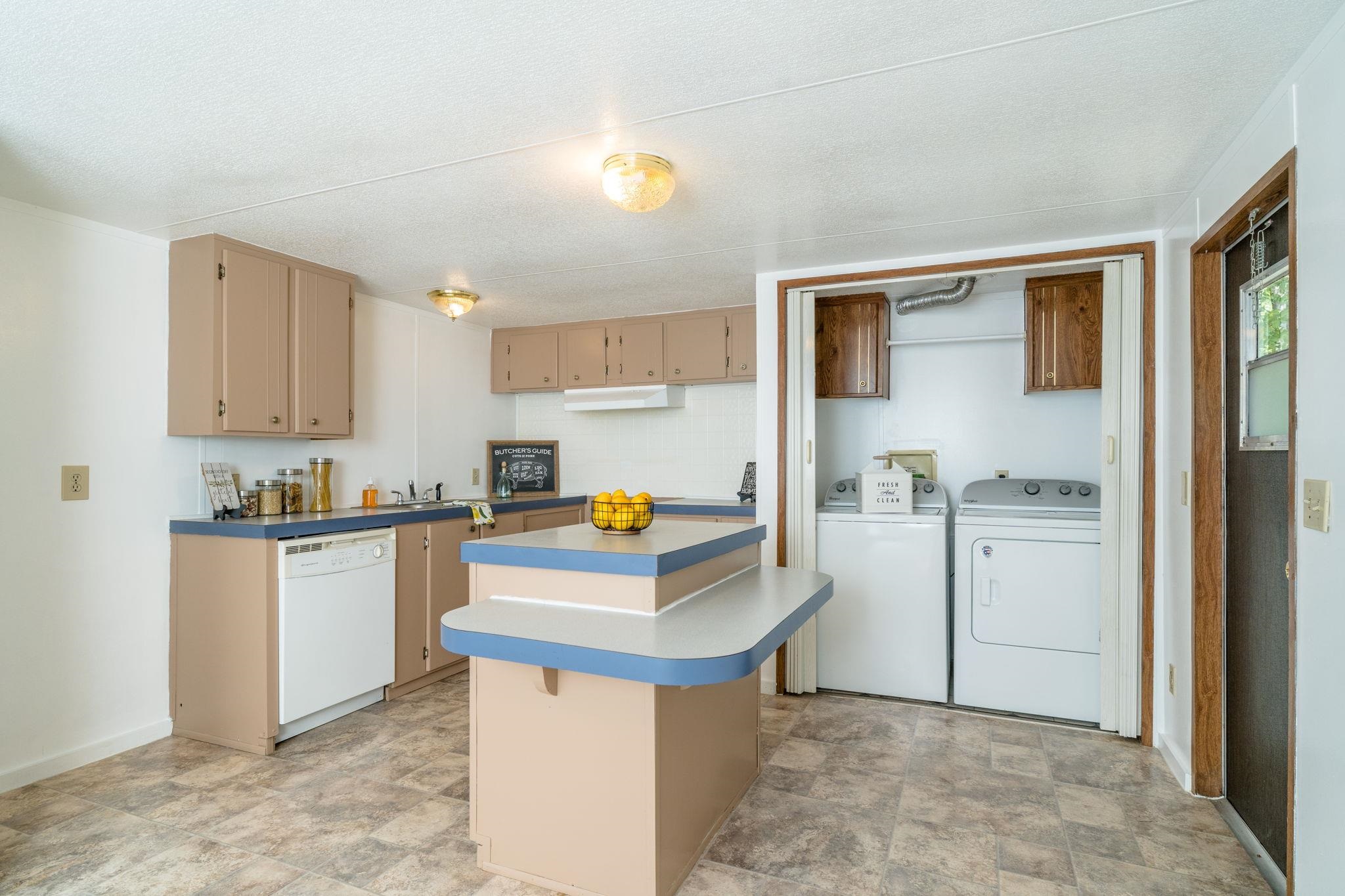 414 Bear Trap Farm Road Mount Solon, VA 22843 - Photo 3 of 40 a kitchen with a sink cabinets and window