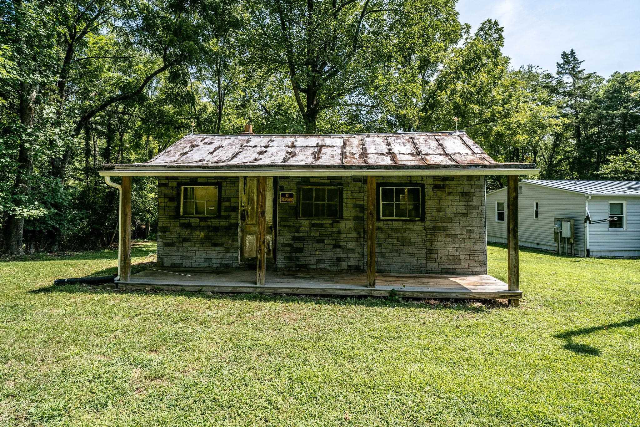414 Bear Trap Farm Road Mount Solon, VA 22843 - Photo 38 of 40 a view of a house with backyard and a tree