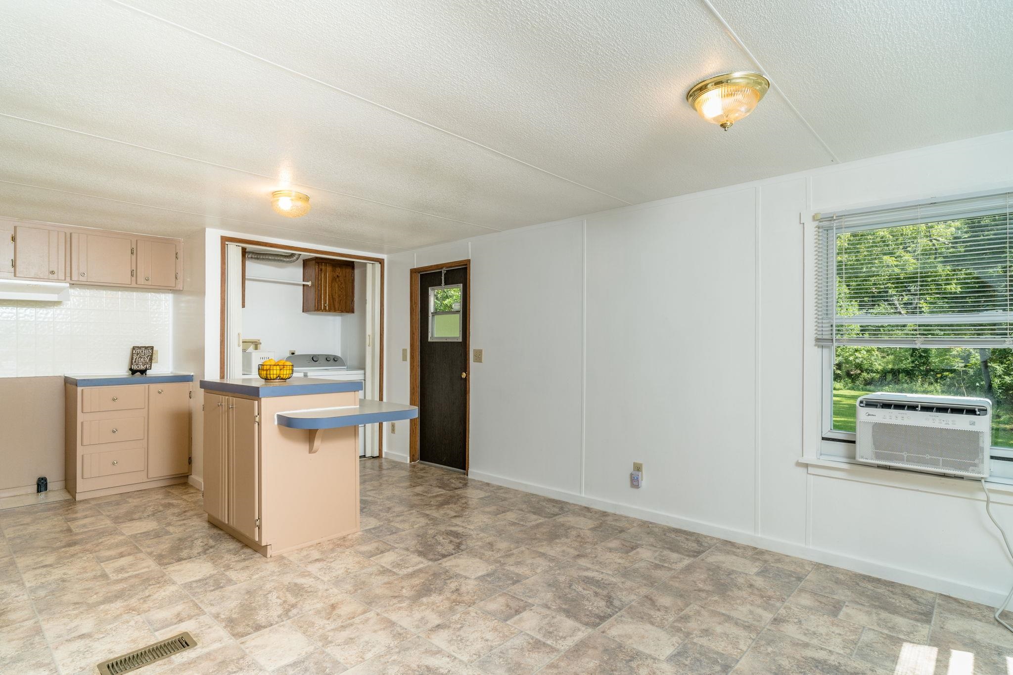 414 Bear Trap Farm Road Mount Solon, VA 22843 - Photo 4 of 40 a kitchen with sink and cabinets