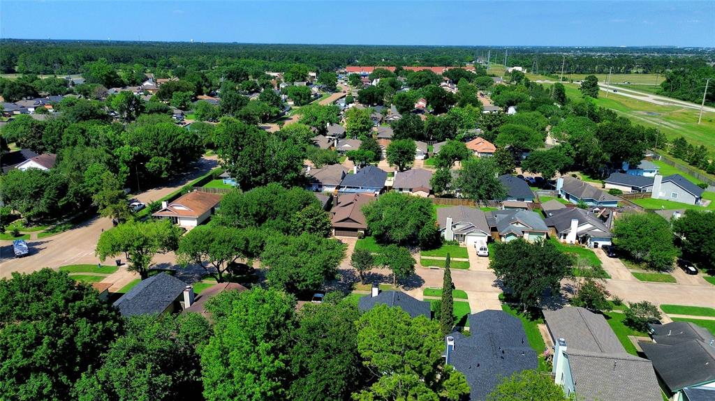 13618 Sablegrove Lane Houston, TX 77014 - Photo 28 of 30 an aerial view of a houses with a yard