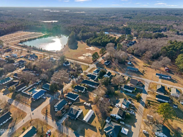 an aerial view of ocean with residential house and ocean view