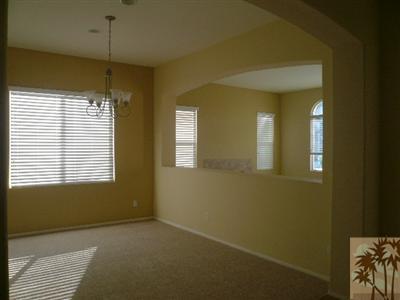 49590 Lewis Road Indio, CA 92201 - Photo 4 of 20 a view of an empty room with a window