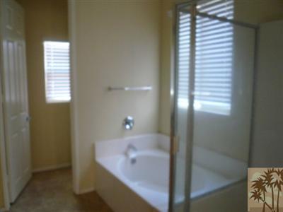 49590 Lewis Road Indio, CA 92201 - Photo 10 of 20 a bathroom with a bathtub