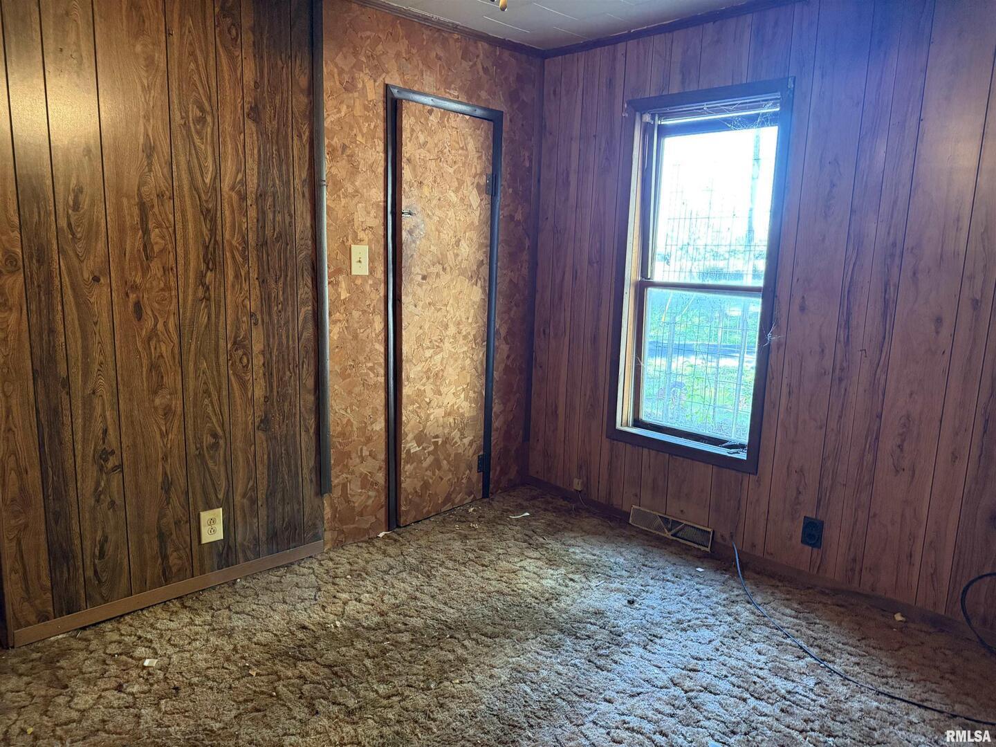 967 Bunker Street Equality, IL 62934 - Photo 8 of 23 a view of an empty room and window
