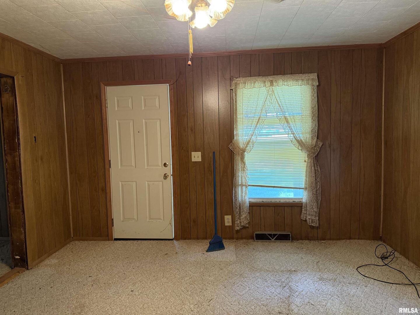 967 Bunker Street Equality, IL 62934 - Photo 10 of 23 an empty room with windows closet and flowerpot