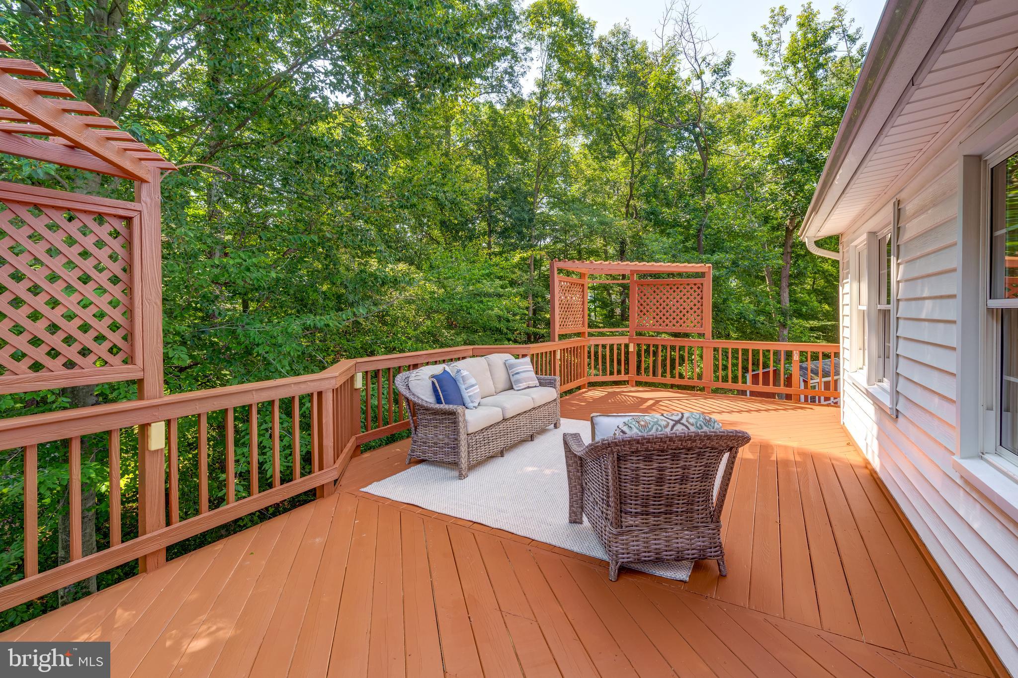 6803 Houndmaster Road Springfield, VA 22152 - Photo 40 of 44 a view of a chairs on the roof deck