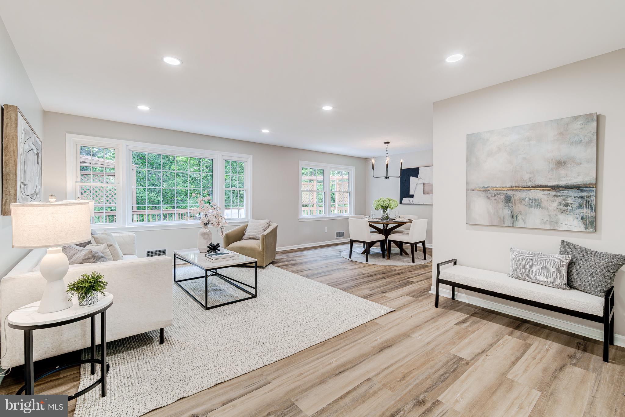 6803 Houndmaster Road Springfield, VA 22152 - Photo 5 of 44 a living room with furniture and a large window