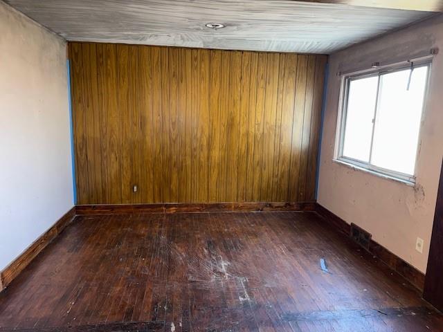 603 Lindsay Road Carnegie, PA 15106 - Photo 6 of 24 an empty room with wooden floor and windows