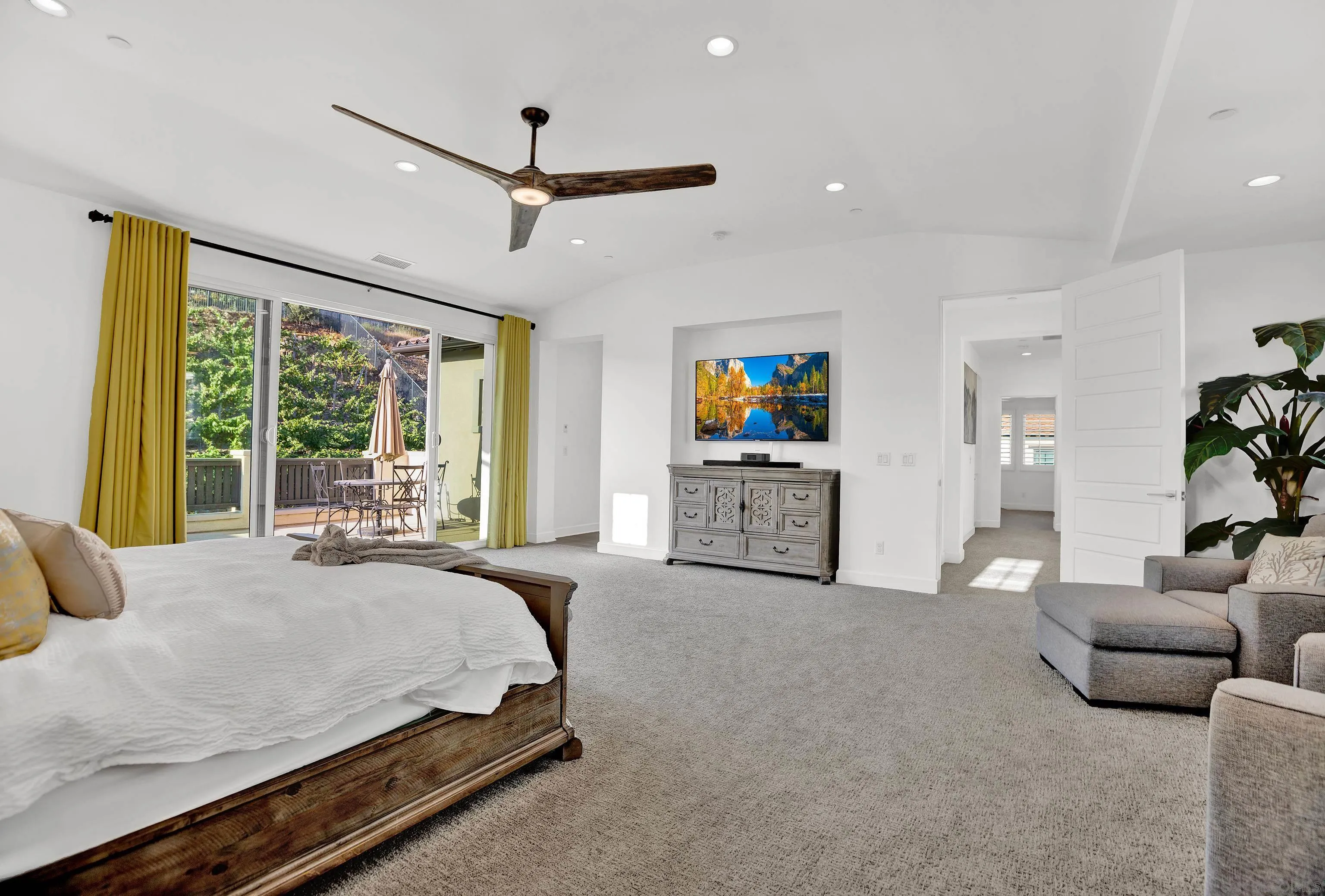 946 Pearl Drive San Marcos, CA 92078 - Photo 30 of 42 a living room with furniture and a flat screen tv
