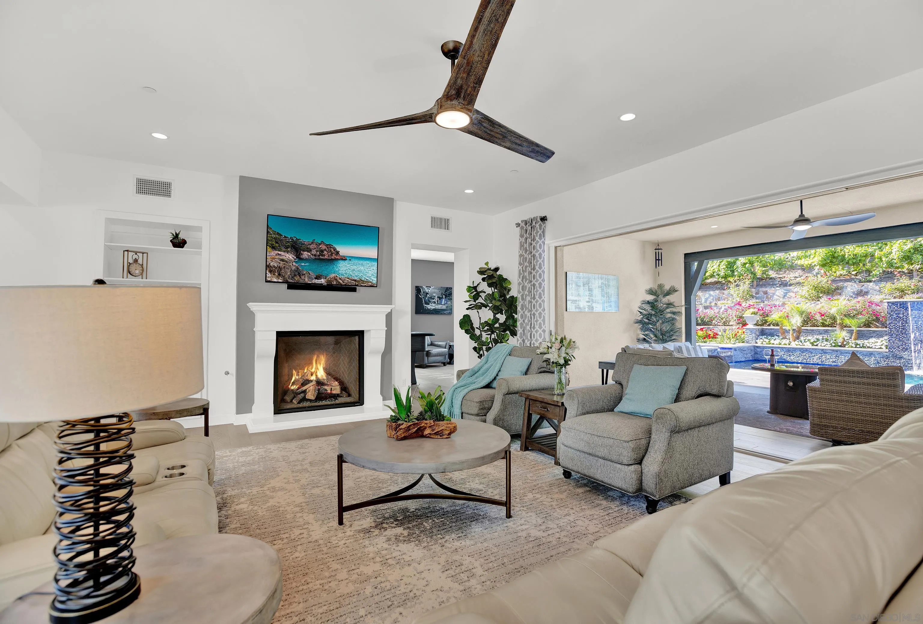 946 Pearl Drive San Marcos, CA 92078 - Photo 9 of 42 a living room with furniture fireplace and window