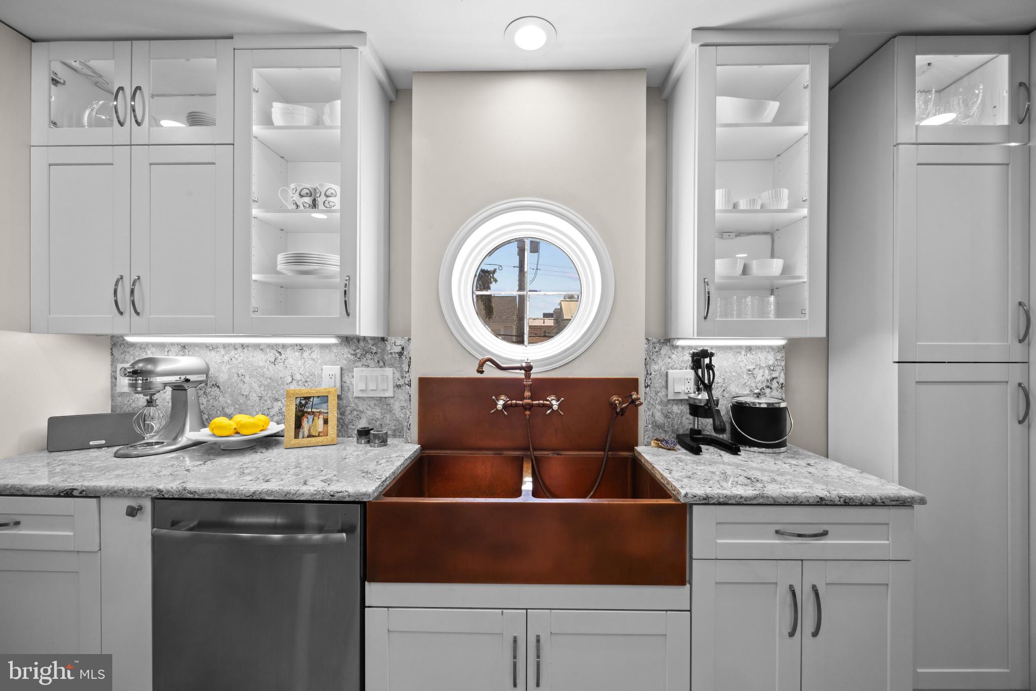 619 Second Street Annapolis, MD 21403 - Photo 15 of 40 Copper sink and porthole window