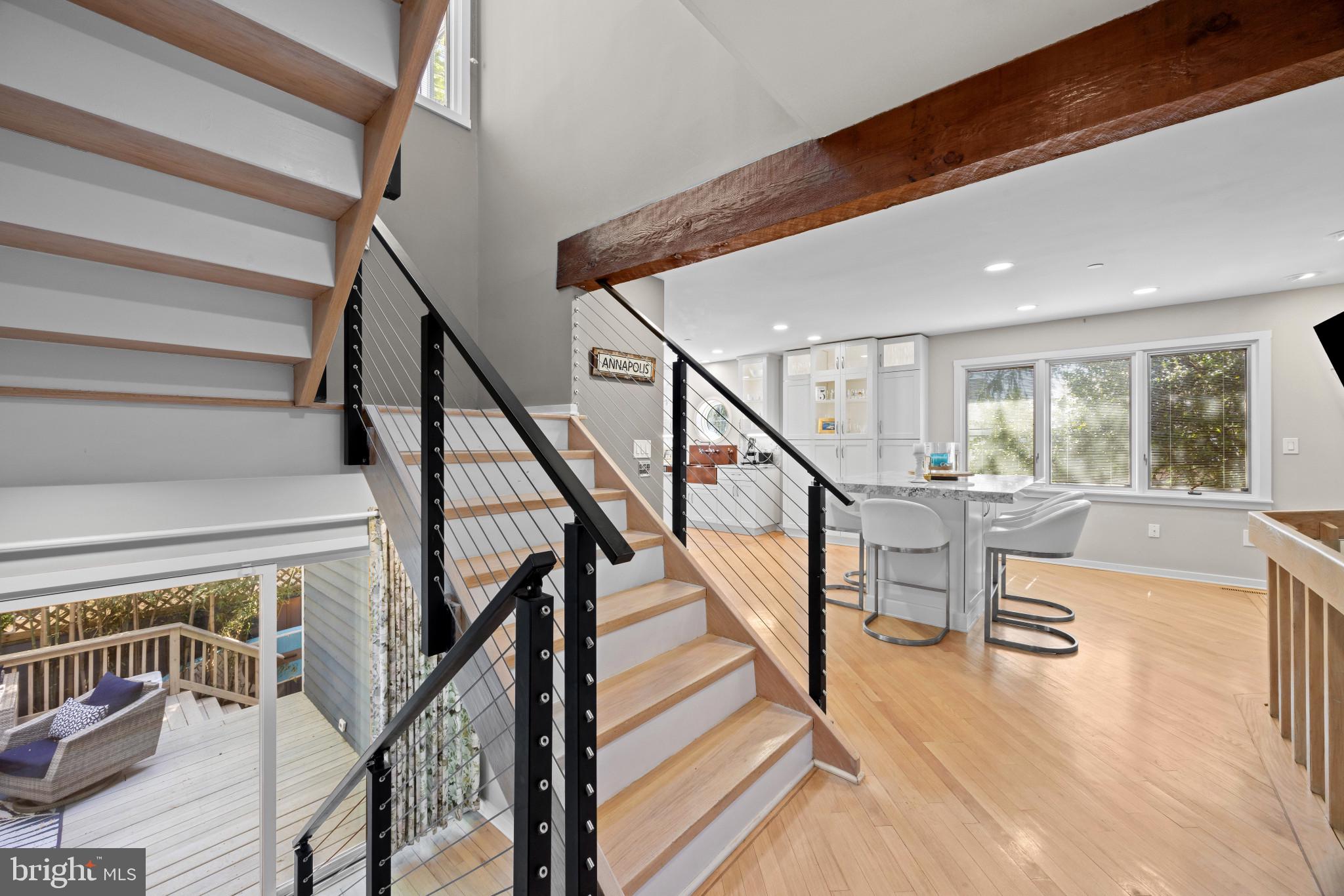 619 Second Street Annapolis, MD 21403 - Photo 10 of 40 Exposed beams and modern stair railing