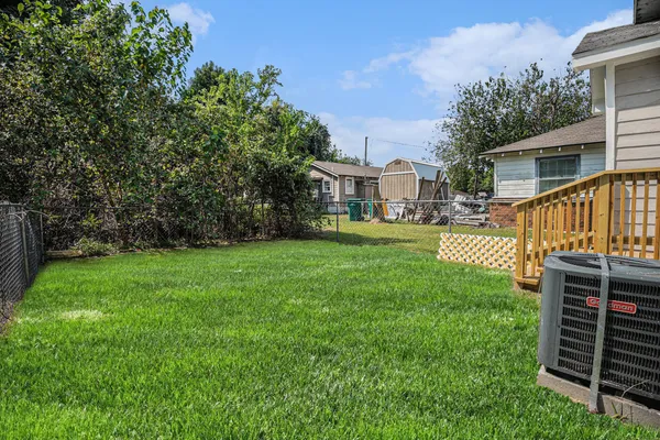 a view of a house with a back yard