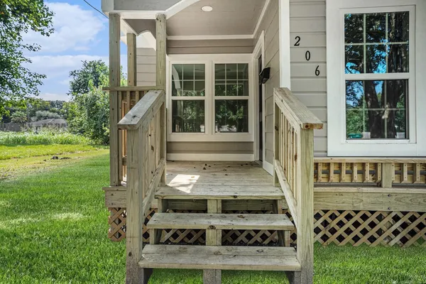 front view of house with a yard