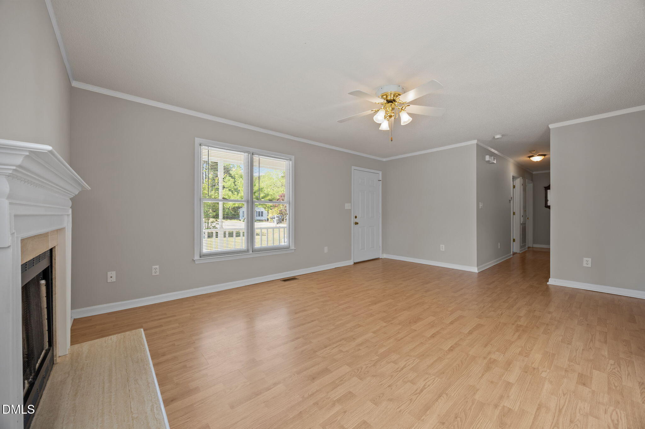 40 Circle Tree Lane Angier, NC 27501 - Photo 7 of 39 a view of empty room with window and fireplace
