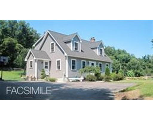 487 Mason Road Ashby, MA 01431 - Photo 1 of 12 a front view of a house with a yard