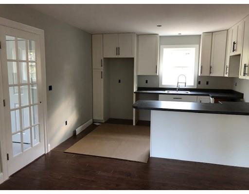 487 Mason Road Ashby, MA 01431 - Photo 12 of 12 a kitchen with stainless steel appliances granite countertop a refrigerator a sink a stove and white cabinets