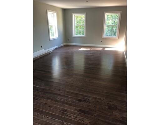 487 Mason Road Ashby, MA 01431 - Photo 10 of 12 a view of an empty room with wooden floor and a window