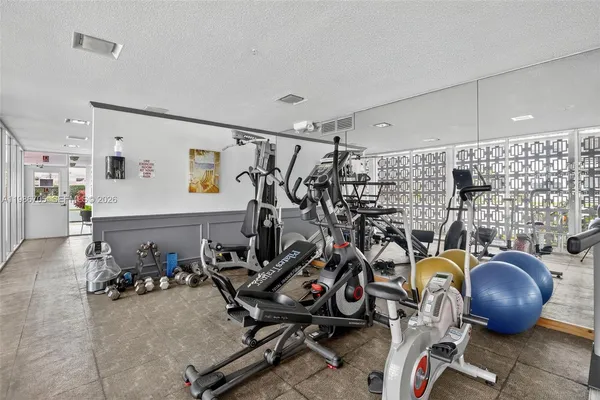 a view of a room with gym equipment