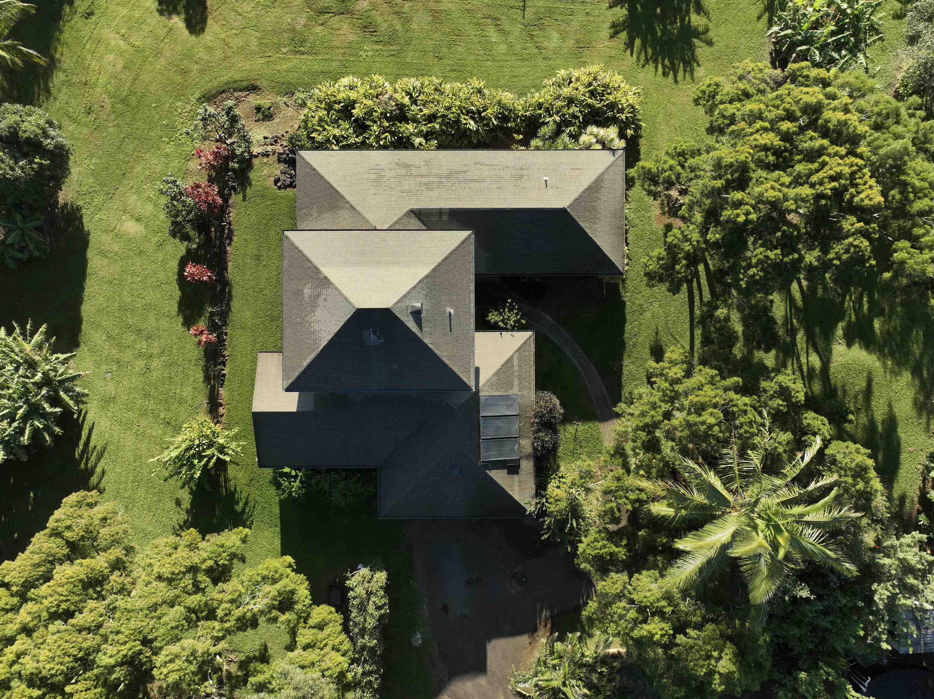 43 West Waipio Road Haiku, HI 96708 - Photo 14 of 44 an aerial view of a house with a yard and mountain view in back