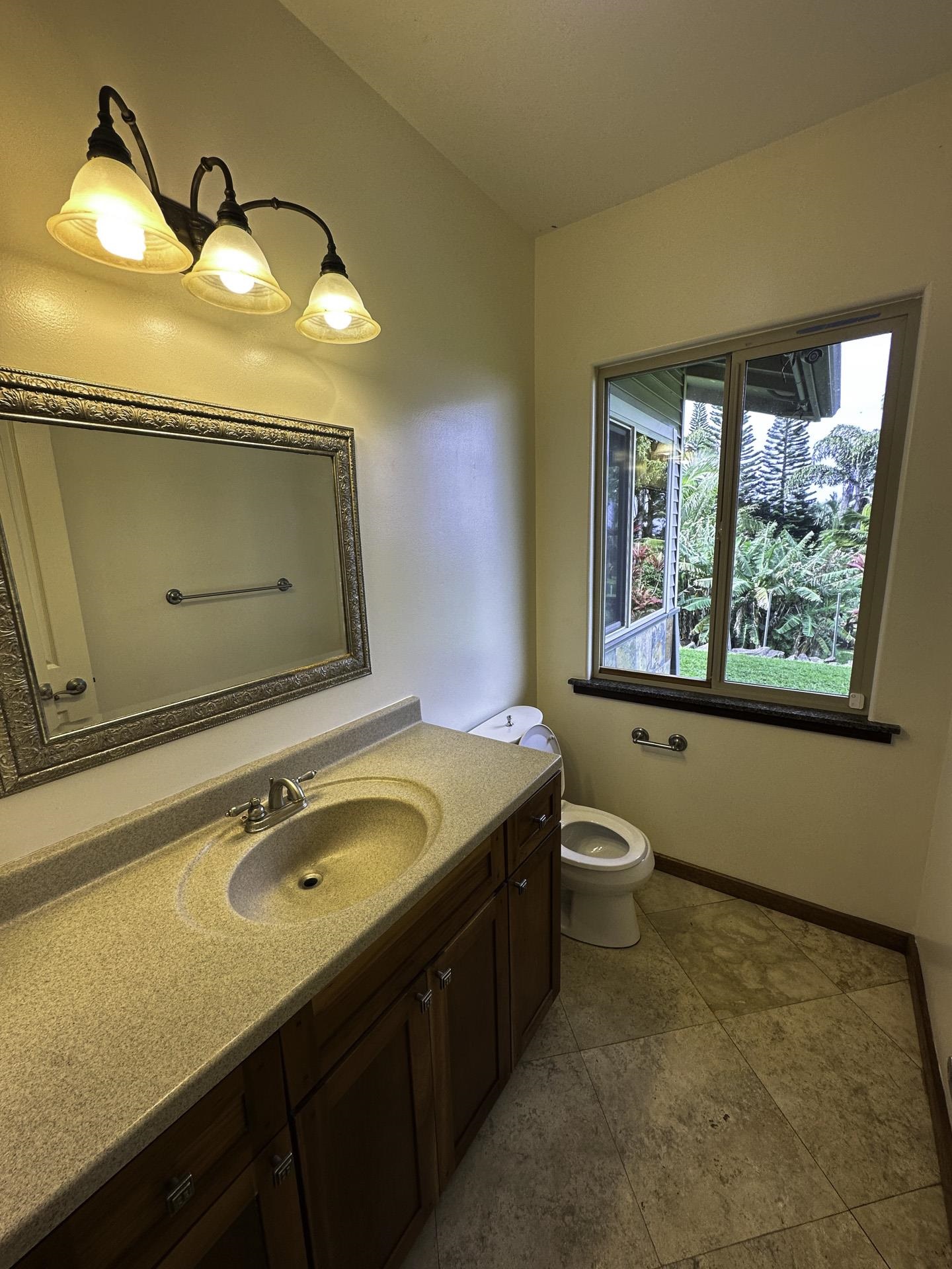 43 West Waipio Road Haiku, HI 96708 - Photo 22 of 44 a bathroom with a sink and a mirror