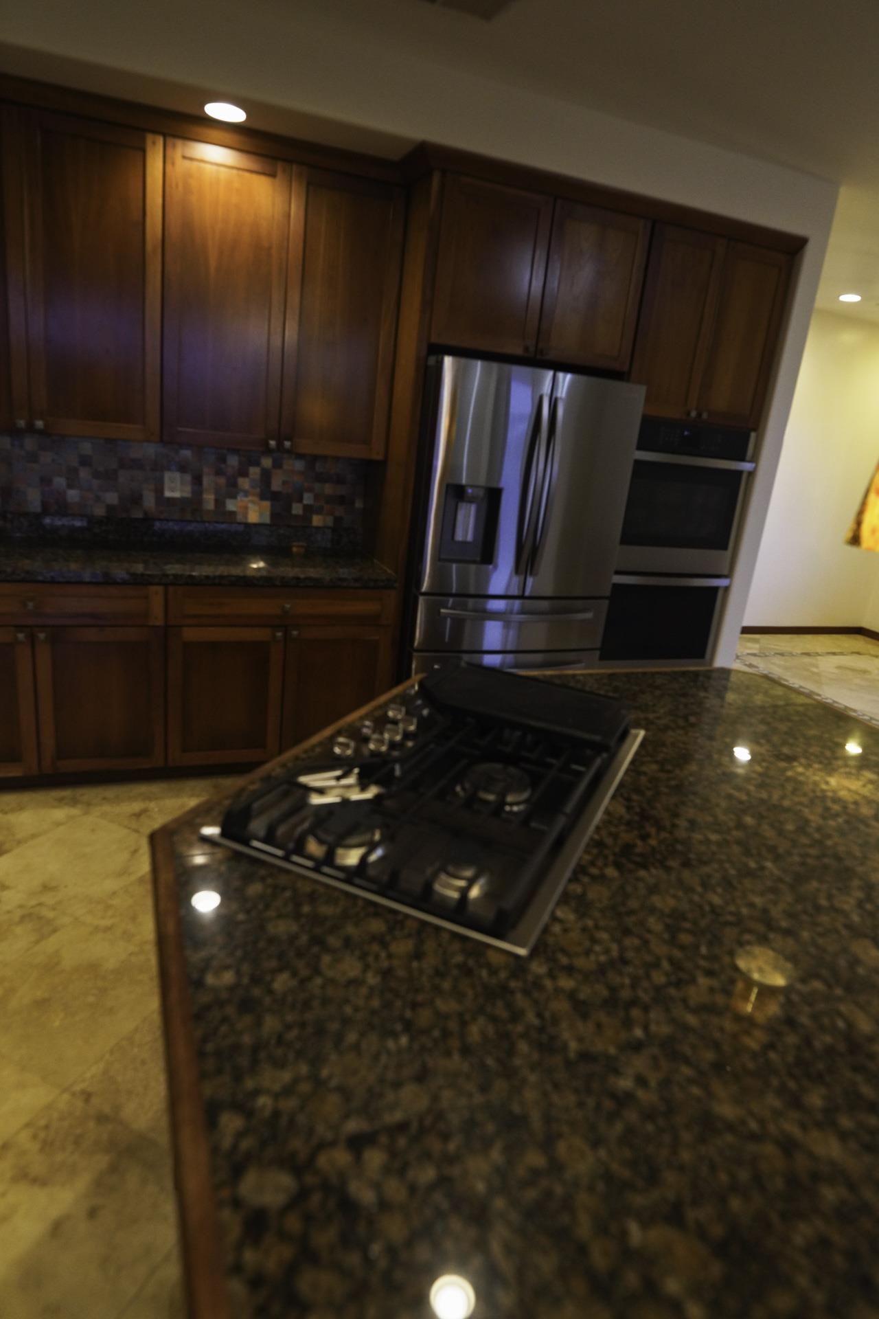 43 West Waipio Road Haiku, HI 96708 - Photo 25 of 44 a stove top oven sitting inside of a kitchen