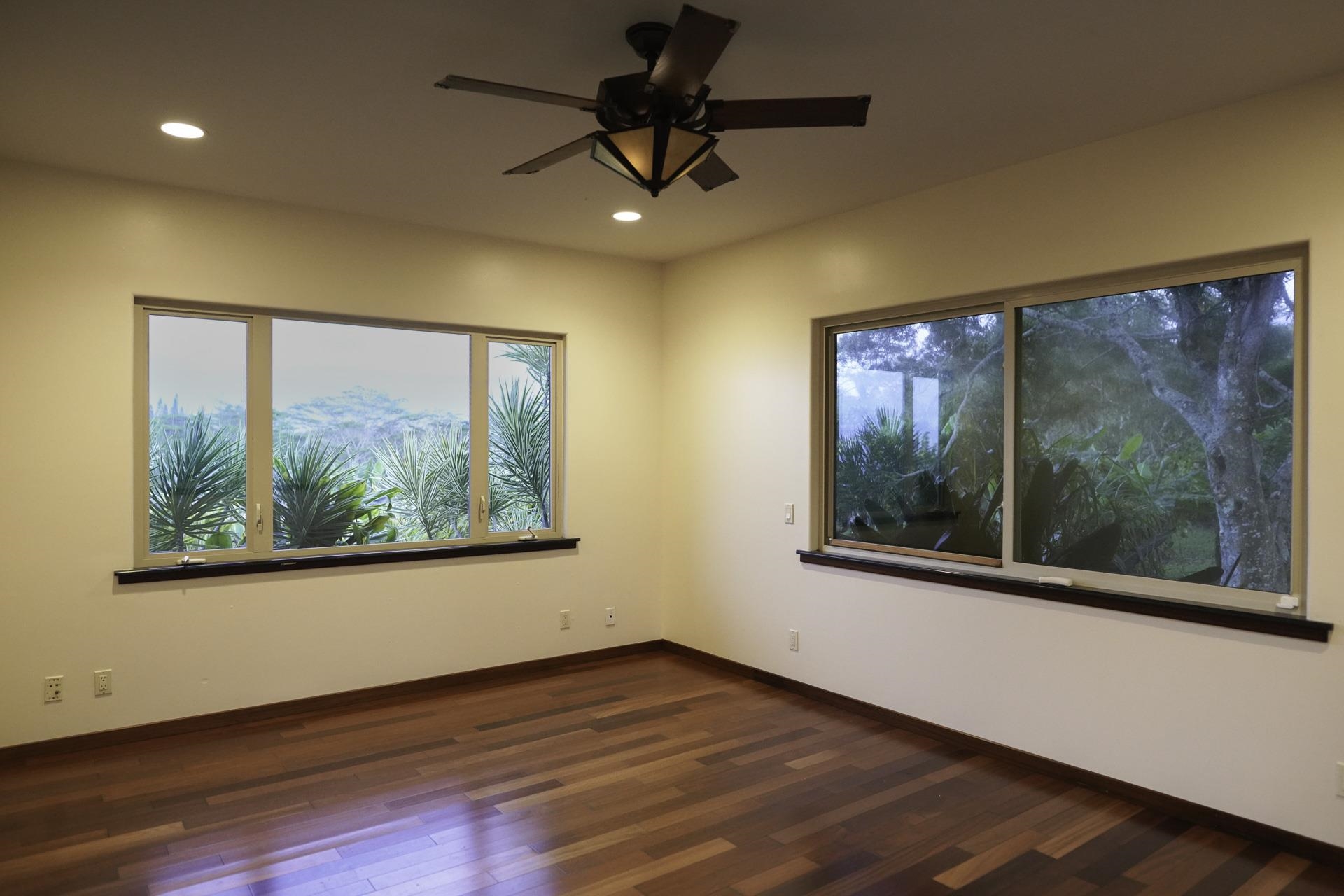 43 West Waipio Road Haiku, HI 96708 - Photo 28 of 44 a view of empty room with wooden floor and fan