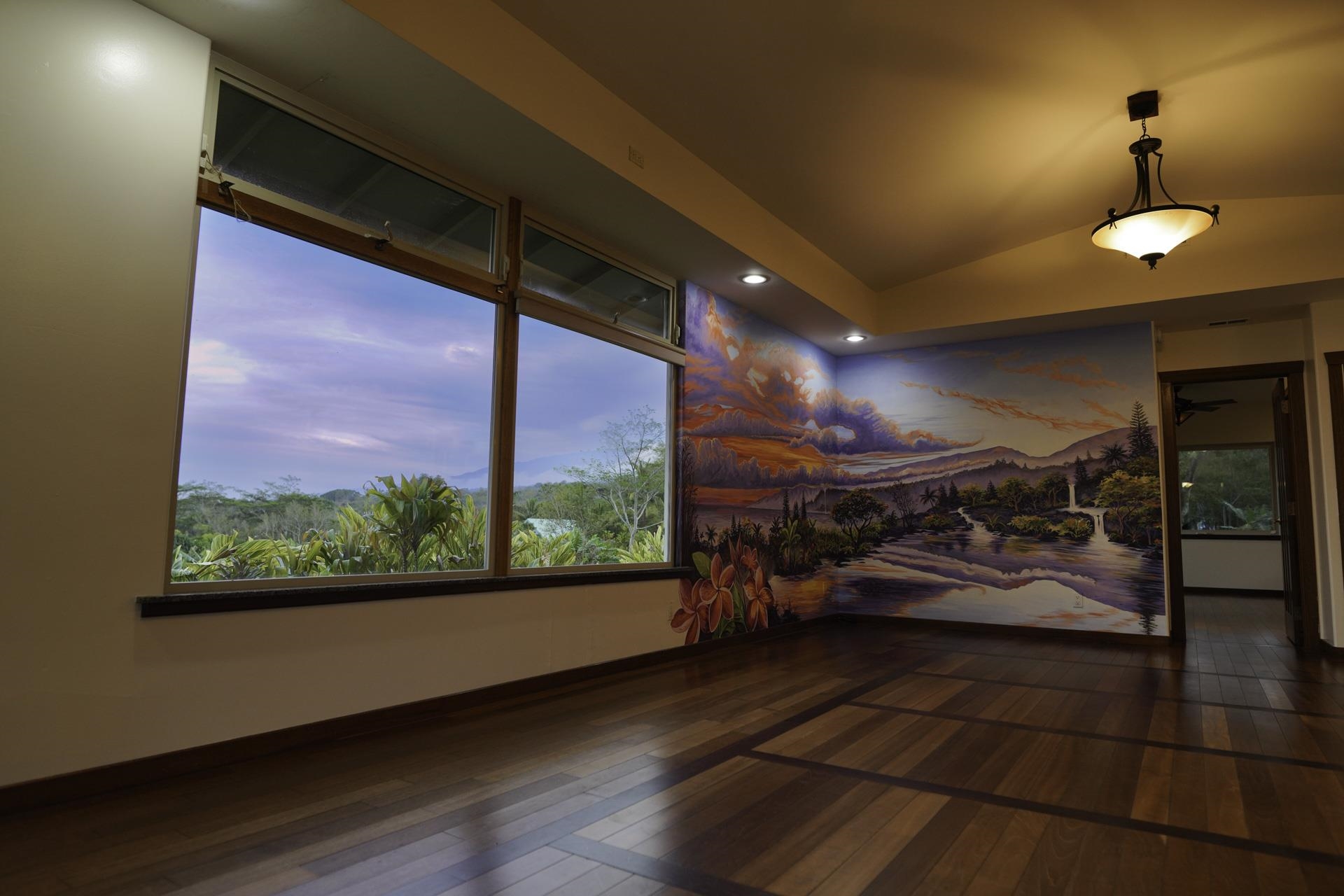 43 West Waipio Road Haiku, HI 96708 - Photo 6 of 44 a view of a living room and a balcony