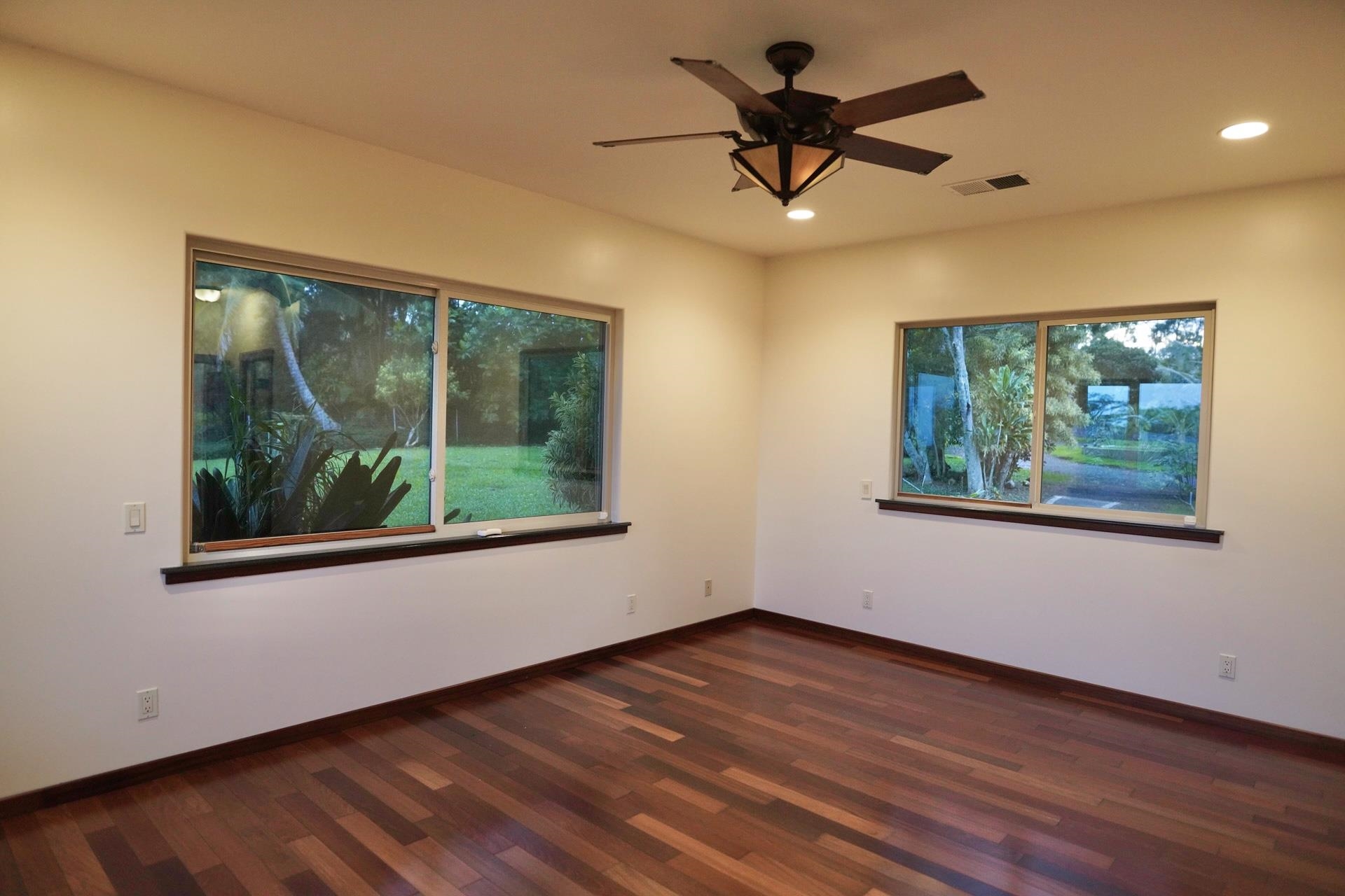 43 West Waipio Road Haiku, HI 96708 - Photo 8 of 44 a view of empty room with wooden floor and fan