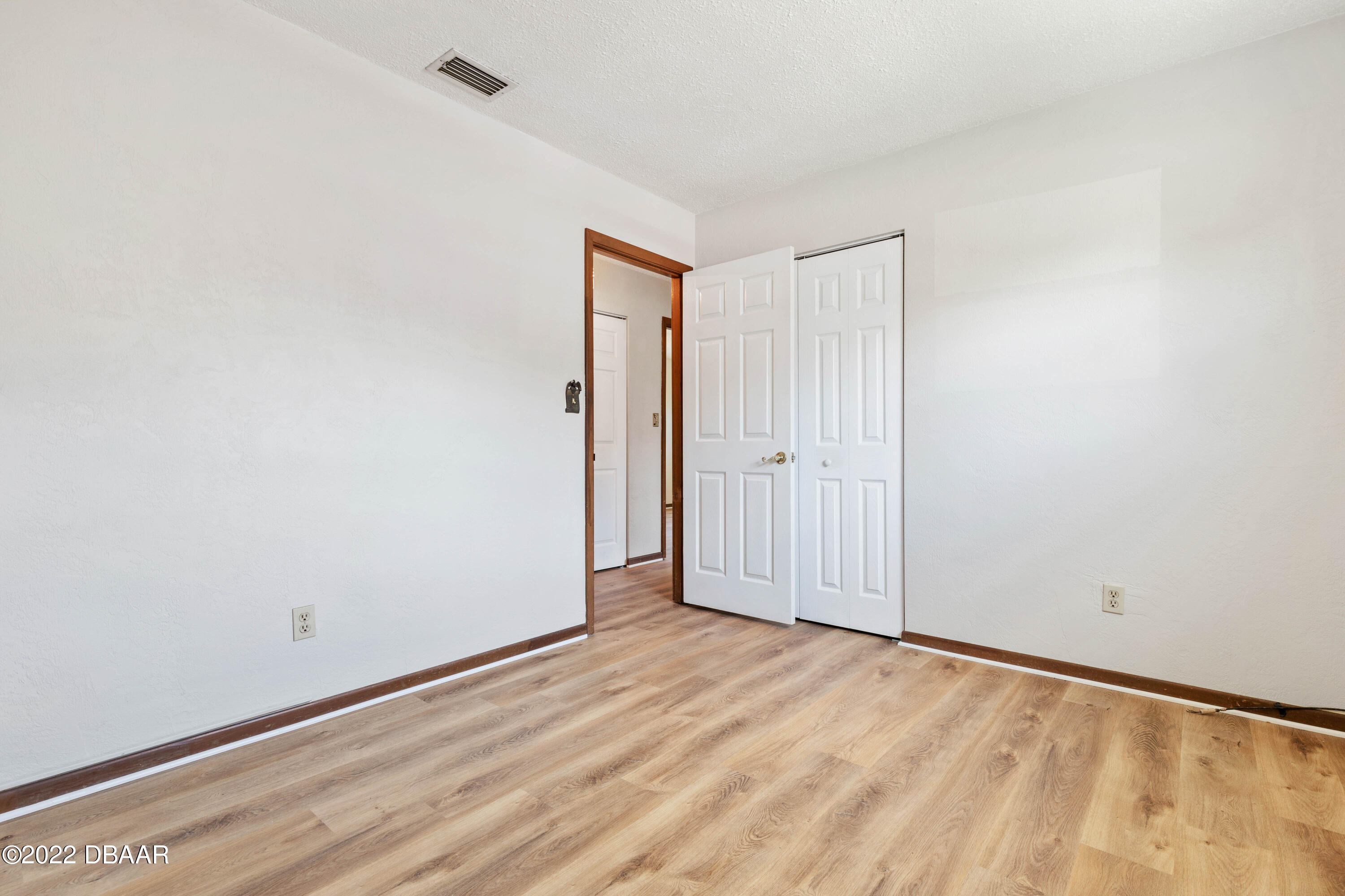 64 Cumberland Avenue Ormond Beach, FL 32174 - Photo 24 of 38 a view of an empty room