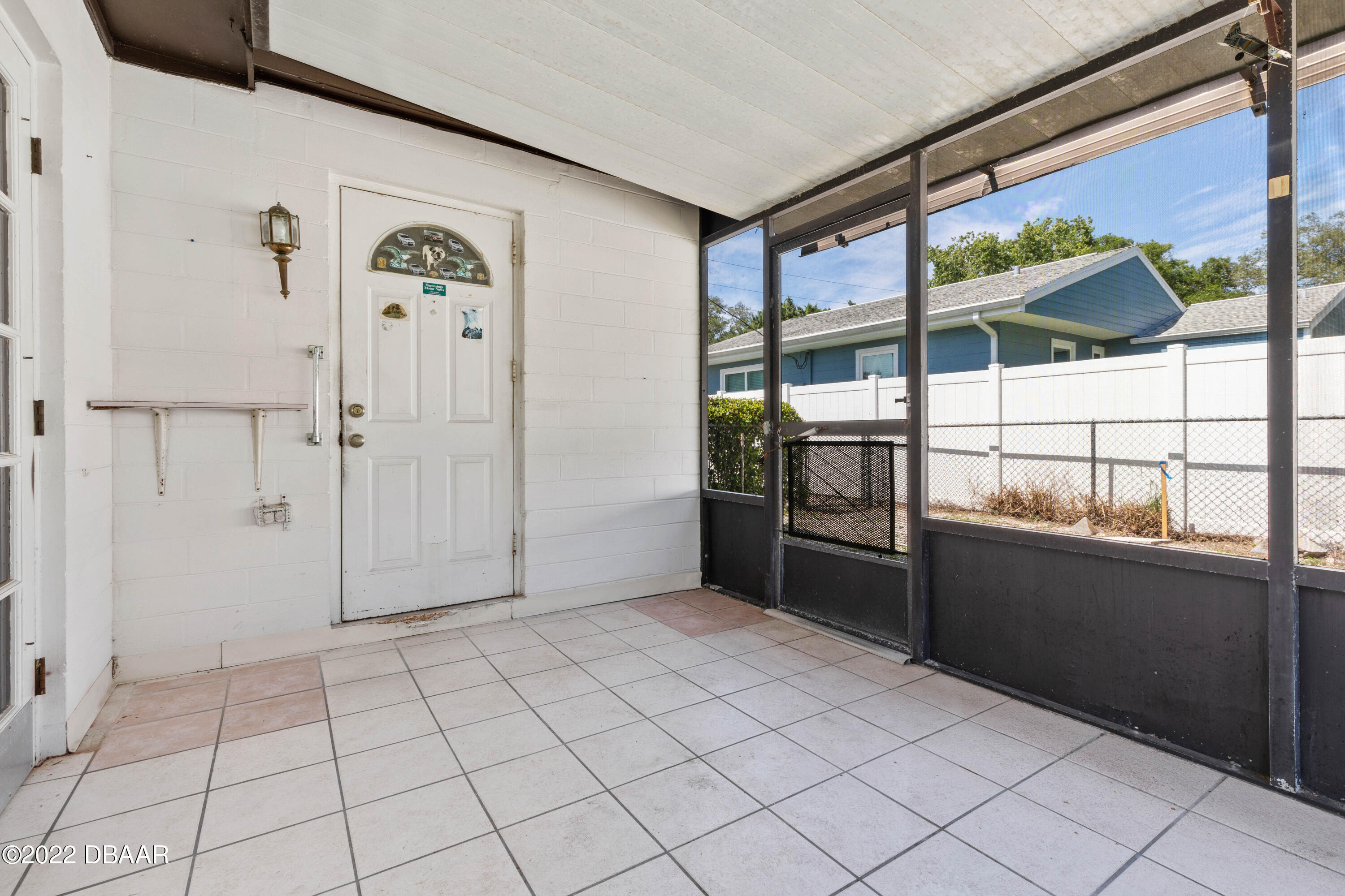 64 Cumberland Avenue Ormond Beach, FL 32174 - Photo 26 of 38 a view of a refrigerator and window