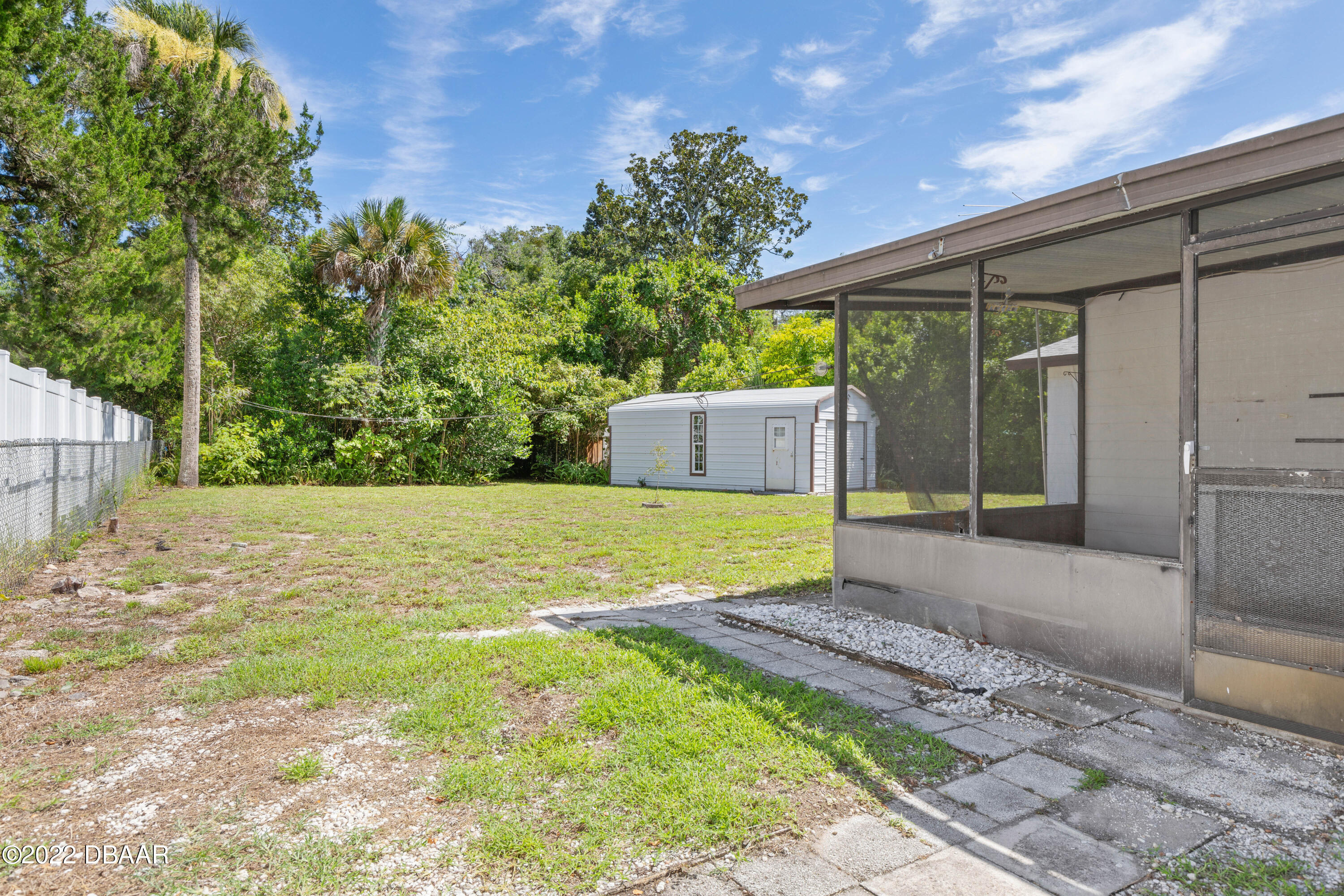 64 Cumberland Avenue Ormond Beach, FL 32174 - Photo 27 of 38 a house view with a outdoor space
