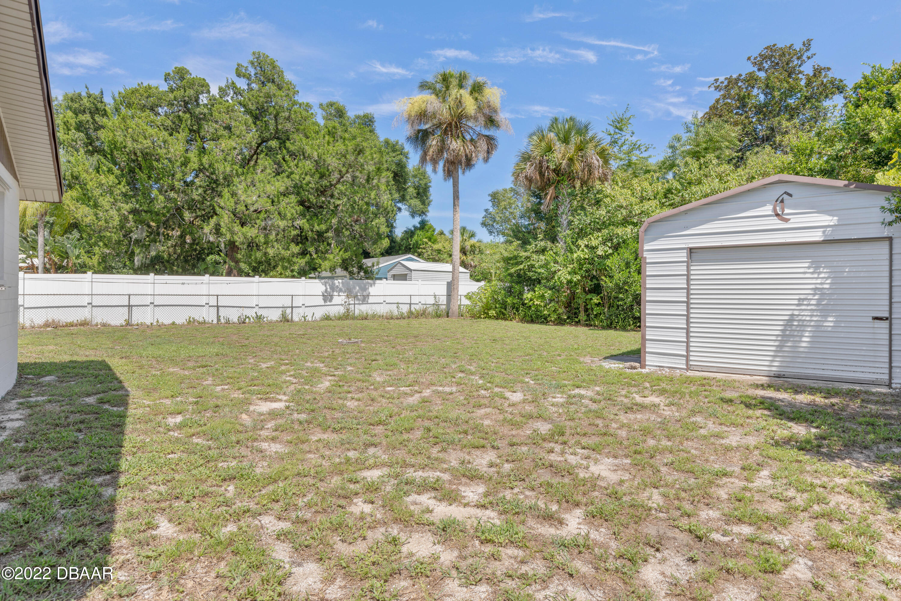 64 Cumberland Avenue Ormond Beach, FL 32174 - Photo 31 of 38 a view of a backyard