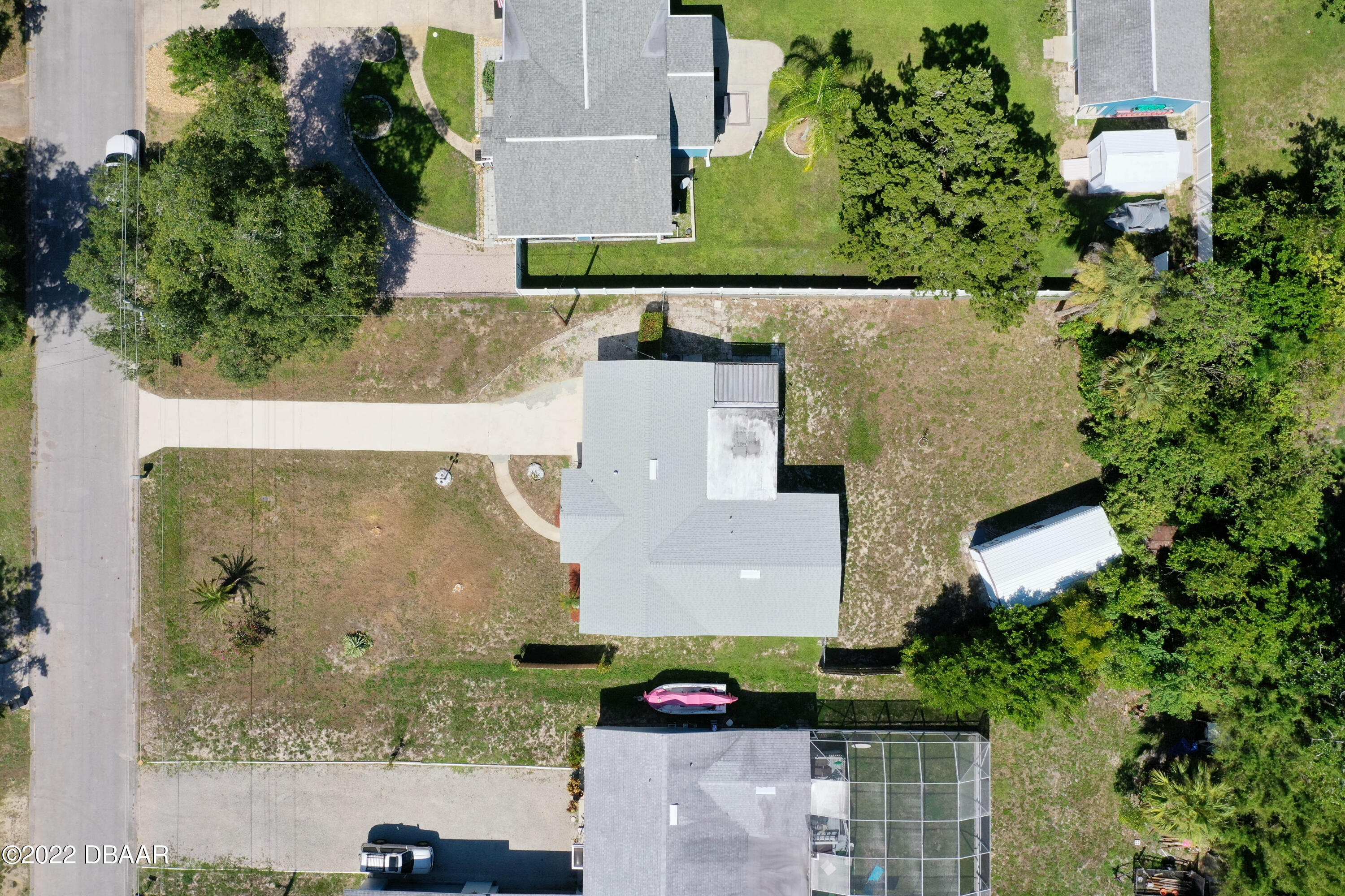 64 Cumberland Avenue Ormond Beach, FL 32174 - Photo 35 of 38 an aerial view of a house with a yard